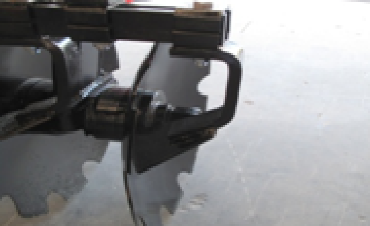 Minimum Residue with an Adjustable Scraper